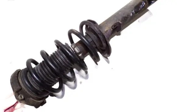 Volkswagen Caddy Front shock absorber with coil spring 1T0413031HQ 1K0412331A