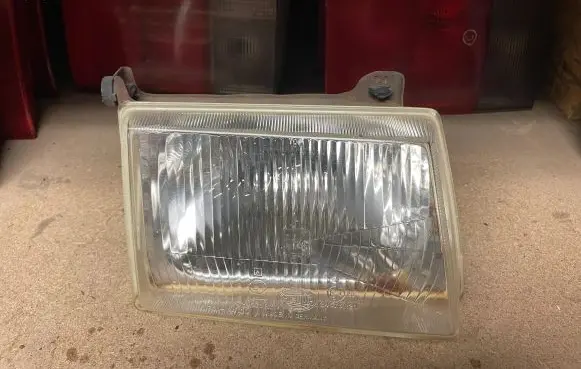 Ford Escort Headlight/headlamp 301124100