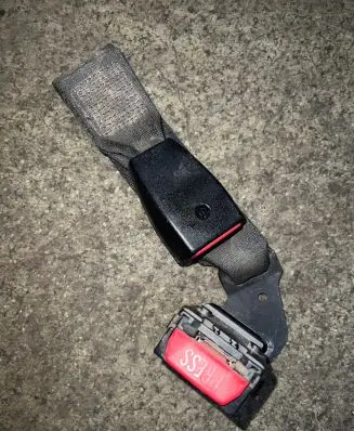 Front seatbelt buckle