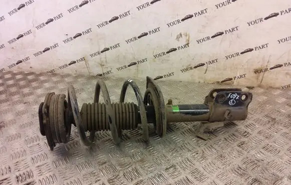 Nissan Leaf II (ZE1) Front shock absorber with coil spring 543035SJ1A