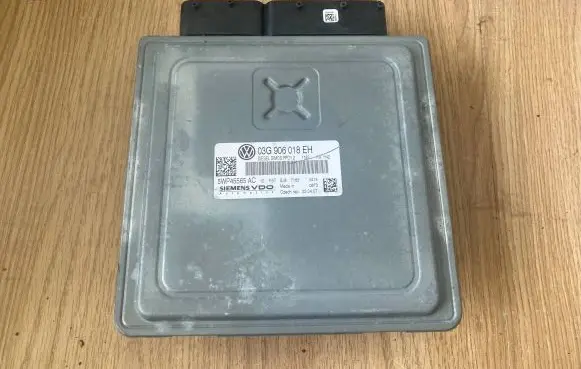 Volkswagen Touran I Engine control unit/module 5WP45565AC 03G906018EH