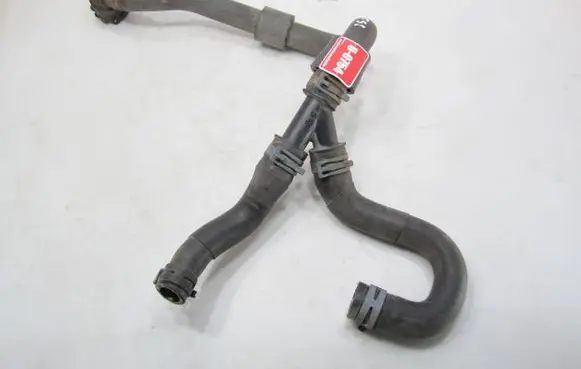 Volkswagen Golf VII Engine coolant pipe/hose 1K0121087Q PA66GF30