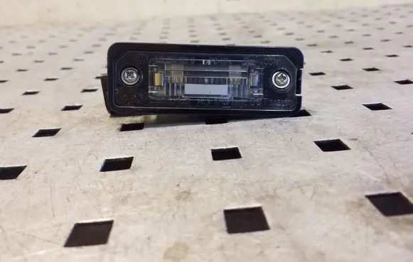 Volkswagen Eos Number plate light 1J6943021B