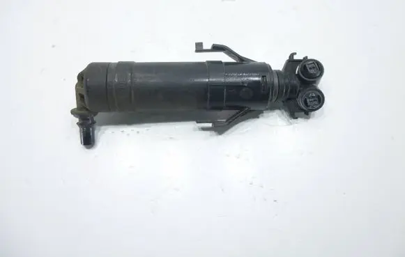 Volkswagen Touran II Headlight washer spray nozzle 1T0955103B