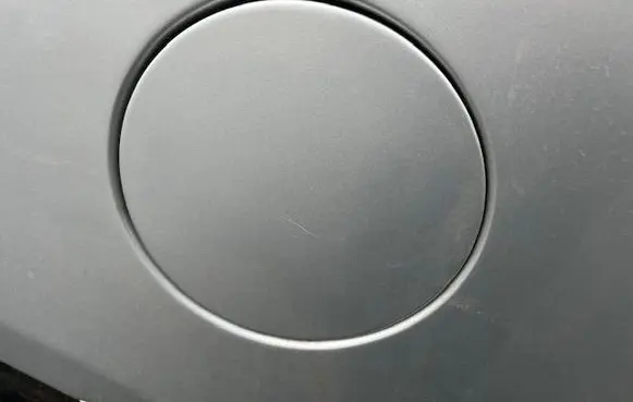 KIA Carens I Fuel tank cap trim 