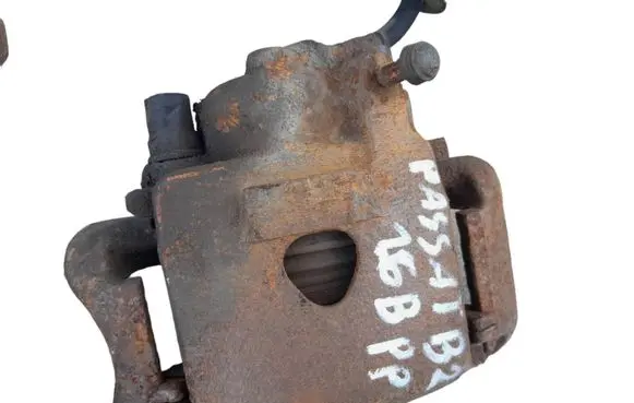 Volkswagen PASSAT B2 Front brake caliper