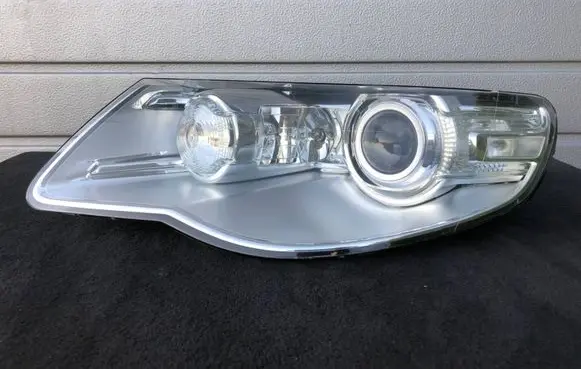Volkswagen Touareg I Headlight/headlamp 7L6941031C 1ZS00945201