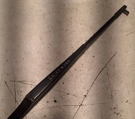 Front wiper blade arm