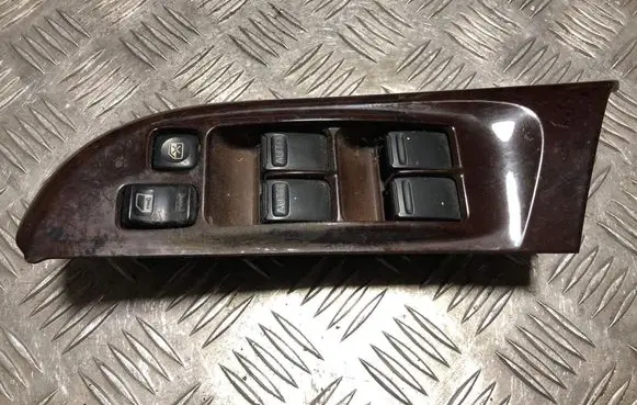 Nissan Maxima Front door window switch trim 809612Y100