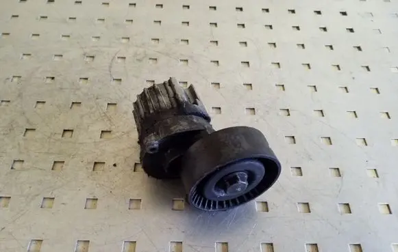 Volkswagen PASSAT B7 Generator/alternator belt tensioner 038903315AJ