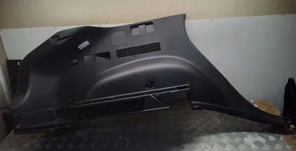 Trunk/boot lower side trim panel