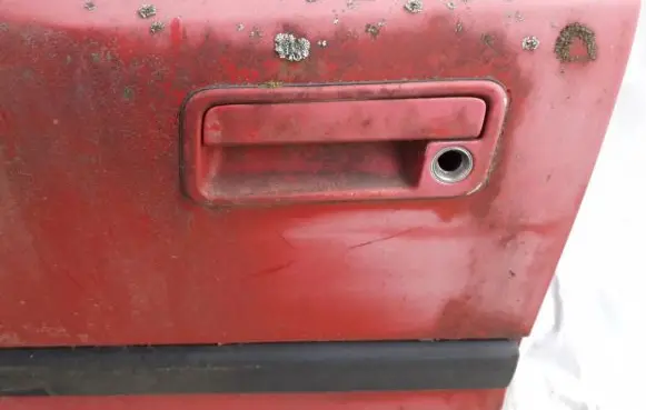 Mazda 323 F Front door exterior handle ISED