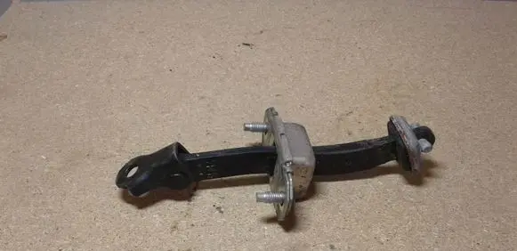 Subaru Outback Rear door check strap stopper