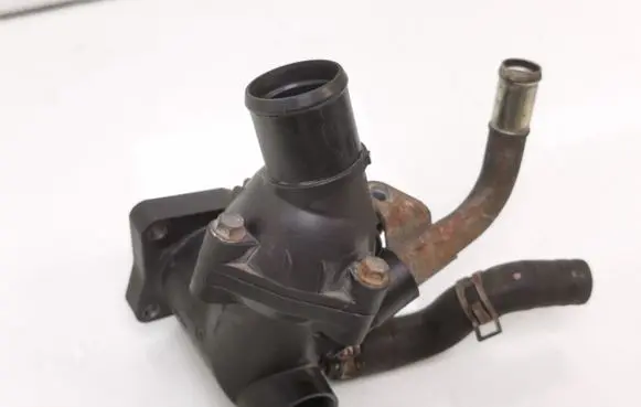 Thermostat/thermostat housing