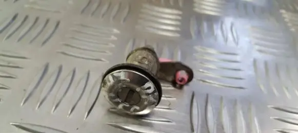 Nissan Almera Front door lock (next to the handle) 
