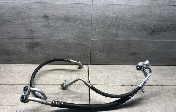 Opel Corsa E Air conditioning (A/C) pipe/hose 13427500