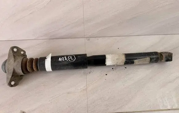 Volkswagen PASSAT B7 Rear shock absorber/damper 