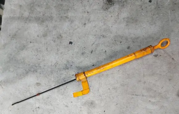 Oil level dip stick