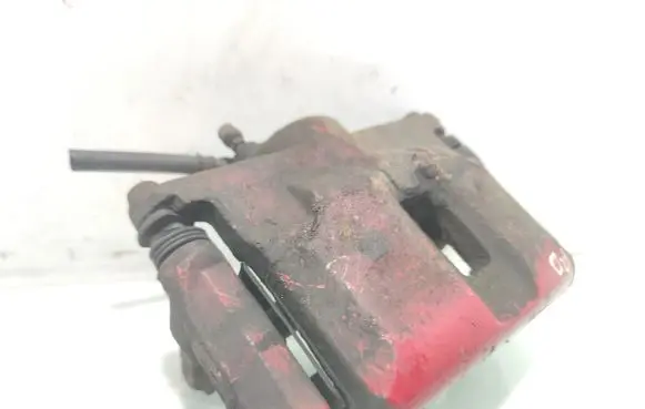 Nissan Juke I F15 Front brake caliper