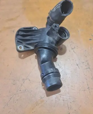 Thermostat/thermostat housing