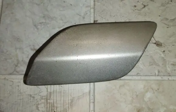 Headlight washer spray nozzle cap/cover