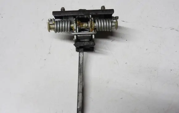 Front door check strap stopper