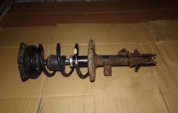 Nissan Micra Front shock absorber with coil spring