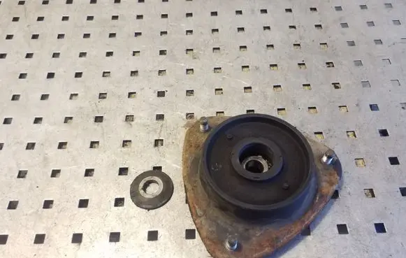 Subaru Outback Front upper strut mount 3F0120