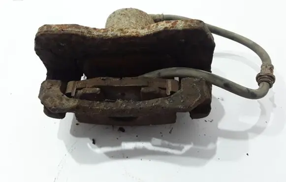 KIA Carens I Front brake caliper 0K2JA33980