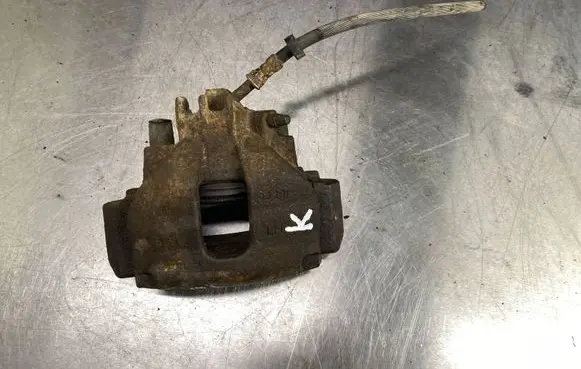 Volvo V70 Front brake caliper 9209723