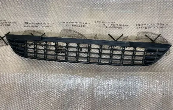 Opel Astra J Front bumper lower grill 13266567