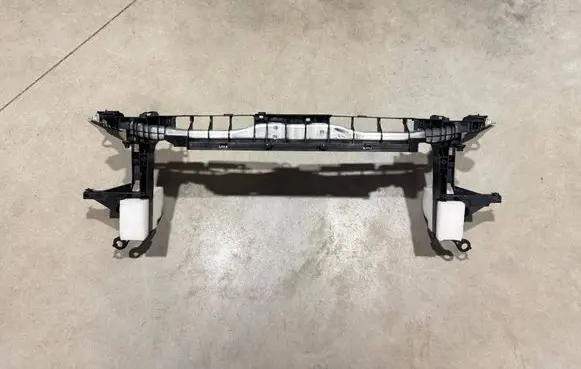 Top upper radiator support slam panel