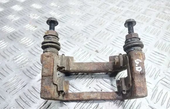 Opel Astra G Brake caliper pad carrier rear 