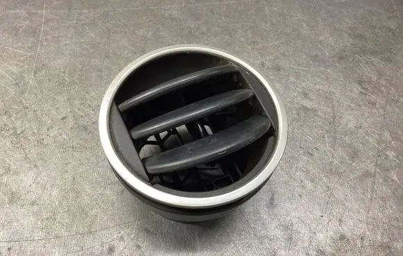 Dash center air vent grill