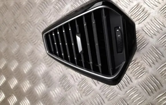 Dashboard side air vent grill/cover trim