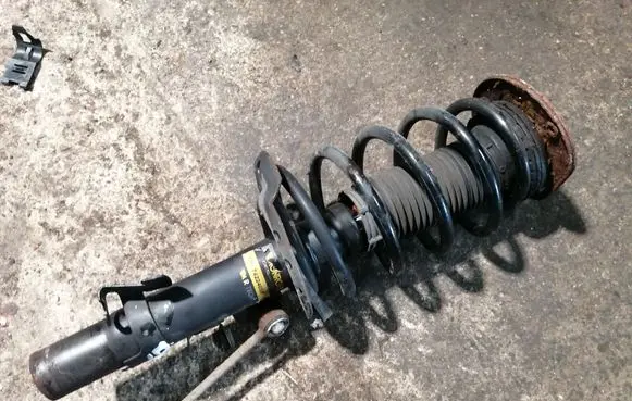 Volvo XC60 Front shock absorber with coil spring