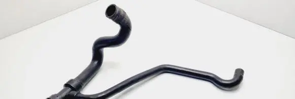 Volkswagen PASSAT B5 Engine coolant pipe/hose 8D0121055F