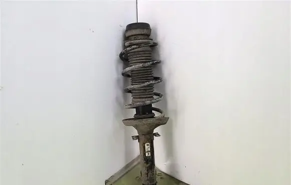 Volkswagen Golf IV Front shock absorber with coil spring 1J0413031S