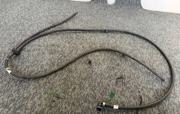 Windshield washer spray nozzle