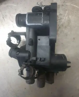 Thermostat/thermostat housing