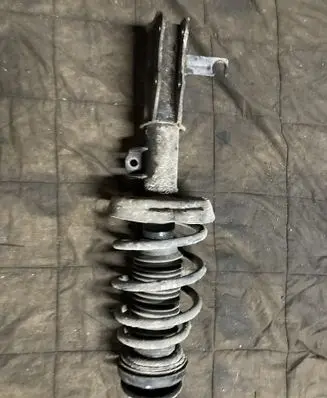 Front shock absorber with coil spring