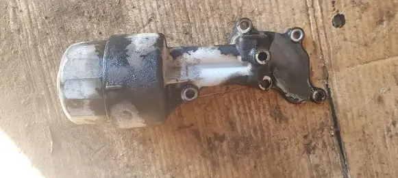 Nissan Primera Oil filter mounting bracket