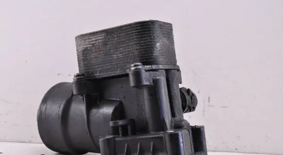 Volkswagen Touran I Oil filter mounting bracket 03L117021C