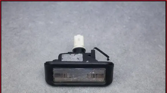 Fiat Doblo Number plate light 44687002 4673719
