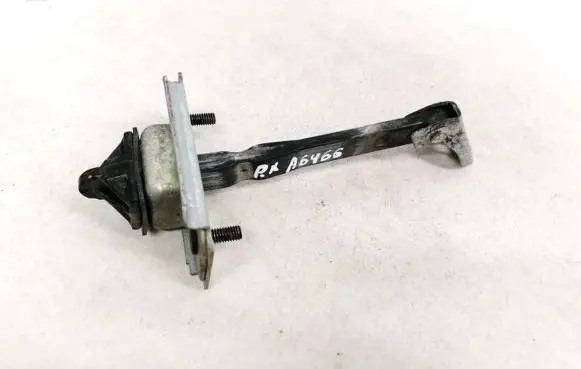 Front door check strap stopper