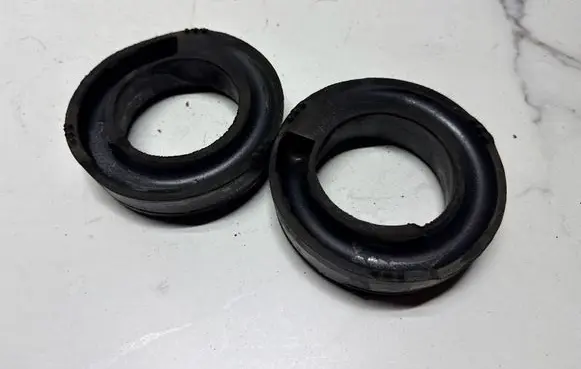Mercedes-Benz E C207 W207 Rear coil spring rubber mount A2103250384
