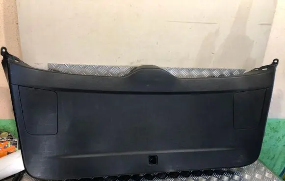 Trunk/boot lower side trim panel