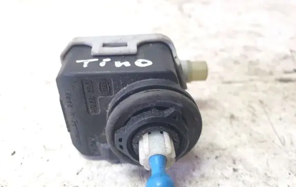 Nissan Almera Tino Headlight level adjustment motor 7700420737