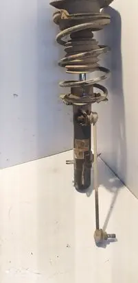 Front shock absorber with coil spring