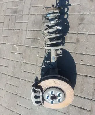 Front shock absorber with coil spring